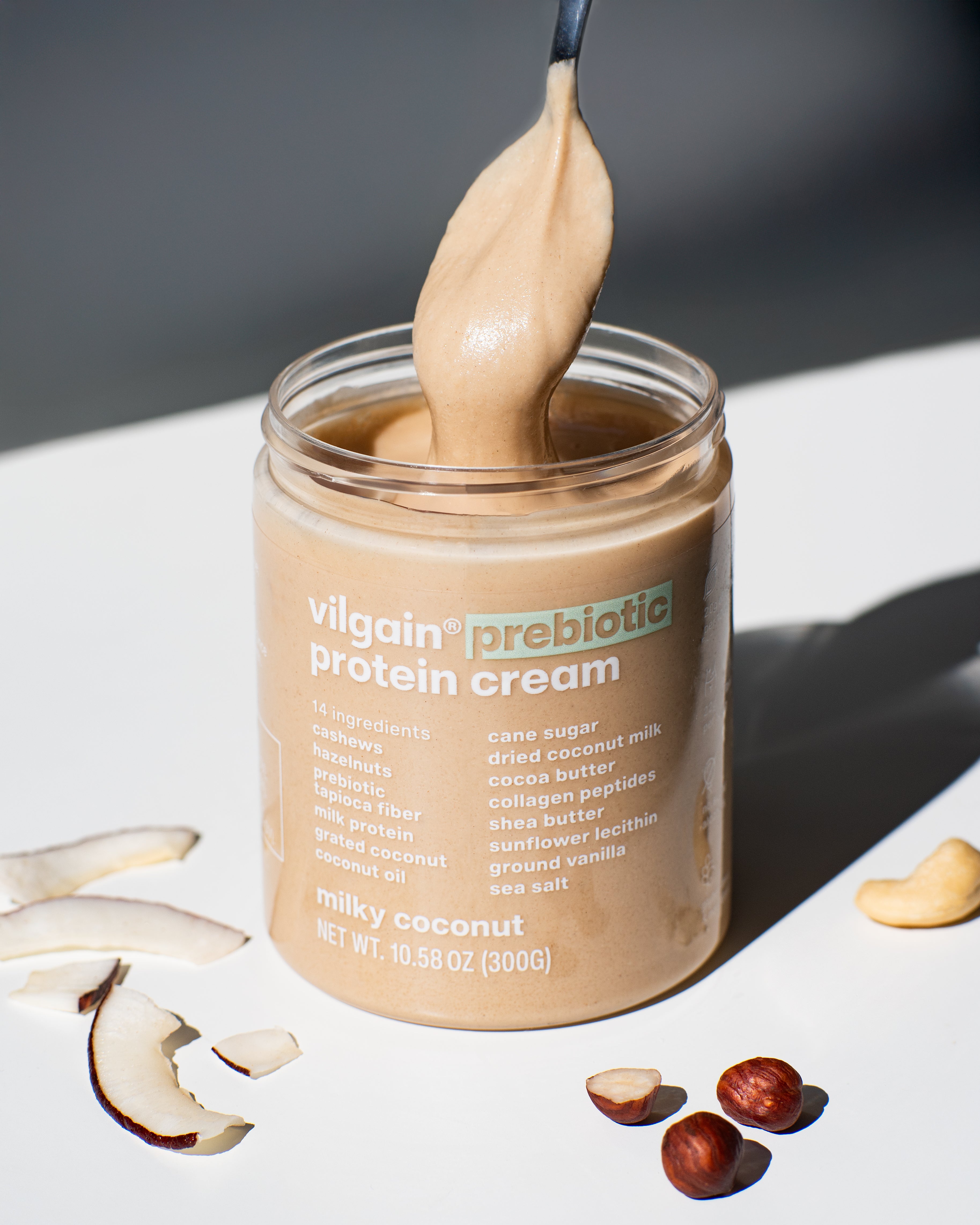 texture of vilgain prebiotic protein cream with milky coconut flavor on a spoon